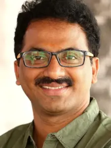 Ashok G.
